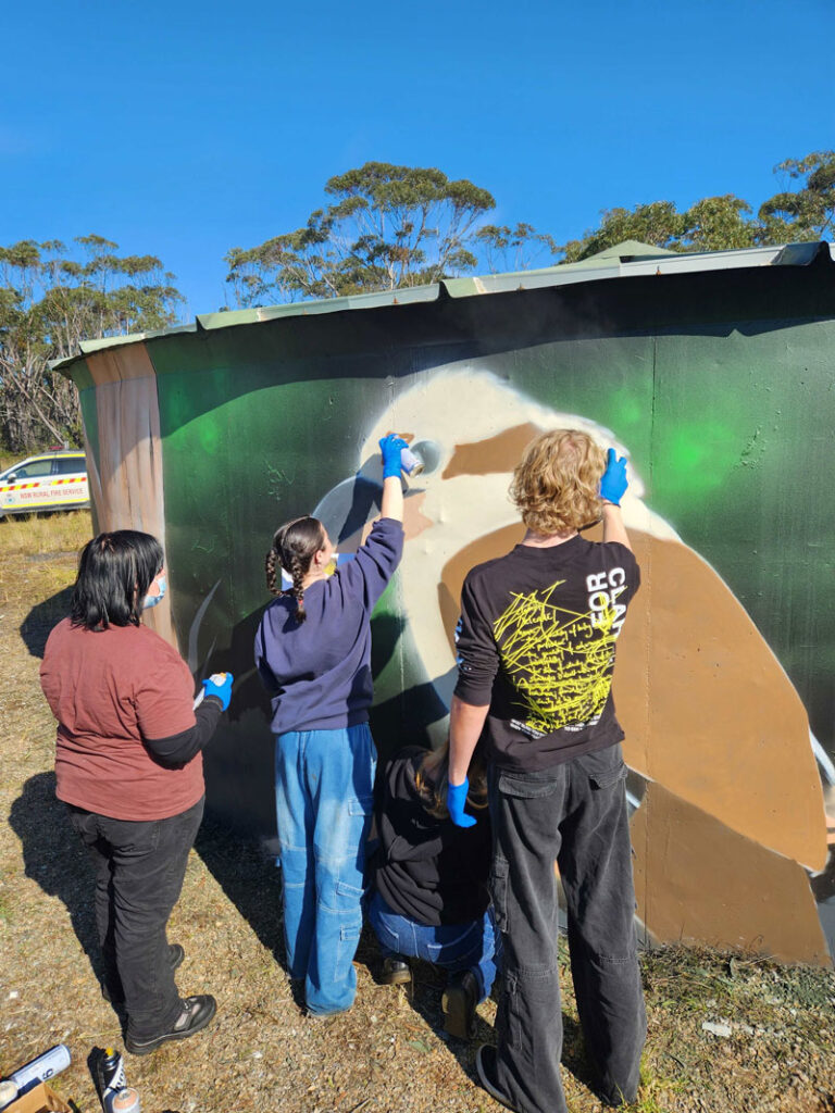 painting of mural 2 MYST Partnership Highlights Rural Fire Service Springwood High School and Nepean Performing Arts High School and two local street artists MYST